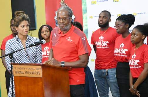 Alfred “Frano” Francis, race director, CB Group/UWI 5K, addresses the launch of the event last Wednesday at The UWI Regional Office. Scholarships were also distributed to students for the 2019-2020 school year. Looking on is Elizabeth Buchanan-Hind (left), chair of the fund-raising event to raise funds for students wishing to pursue tertiary education, but in need of financial assistance. Alfred “Frano” Francis, race director, CB Group/UWI 5K, addresses the launch of the event last Wednesday at The UWI Regional Office. Scholarships were also distributed to students for the 2019-2020 school year. Looking on is Elizabeth Buchanan-Hind (left), chair of the fund-raising event to raise funds for students wishing to pursue tertiary education, but in need of financial assistance.